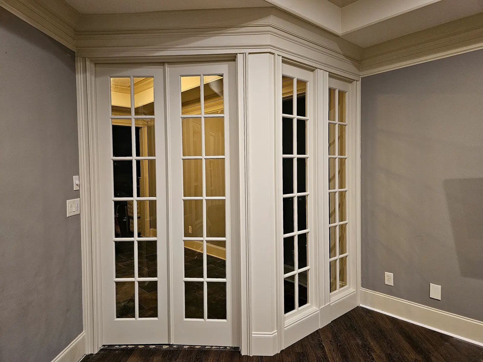White French doors with glass panes installed between rooms